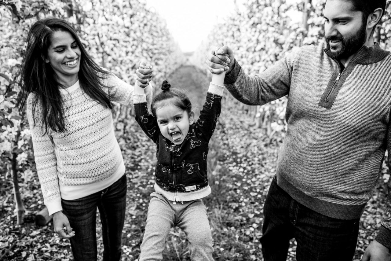 Victoria BC Family Photographer | family in an orchard playing