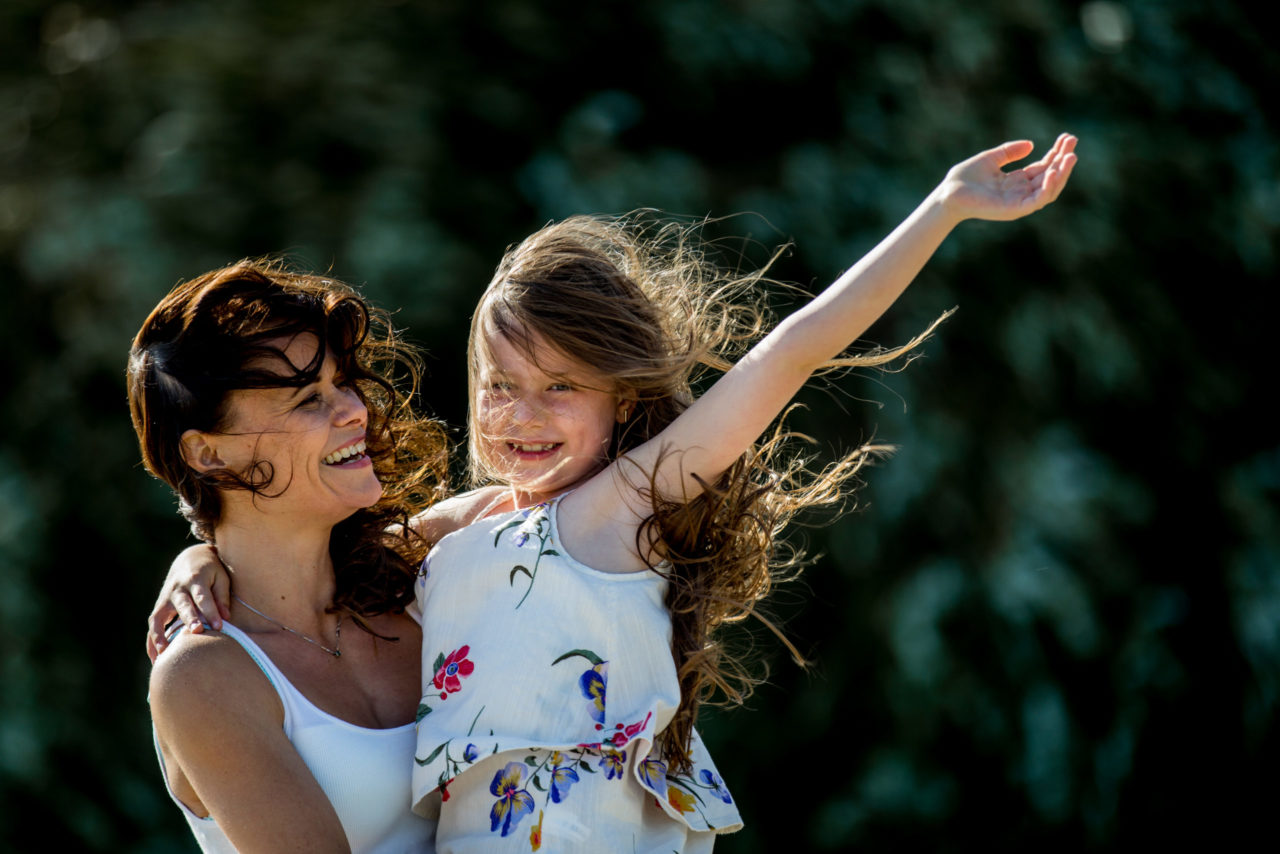 Victoria BC Family Photographer | mother and daughter at the park in the wind neck point